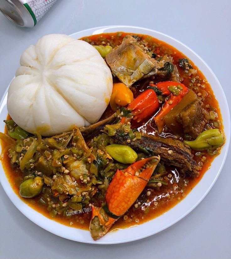 Banku with okro soup, crab and fish