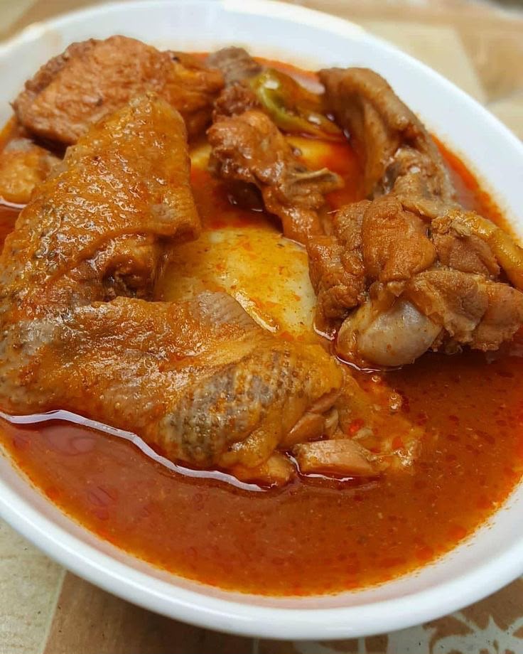 Chicken light soup with banku
