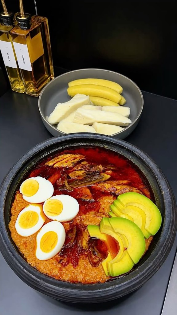 Bean stew with eggs, avocado, yam and plantain