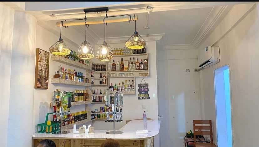 Bar shelves and pendant lights at Eslyn Local Kitchen & Pub